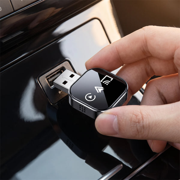 Hand holding the compact adapter