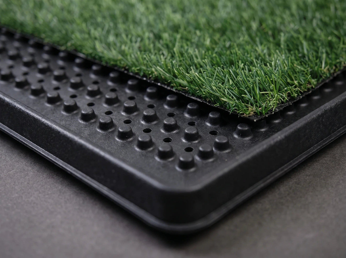 Turfio Indoor Dog Potty — Washable collection tray under washable synthetic turf, with a splash wall — no drainage bag, no subscription, nothing to rebuy